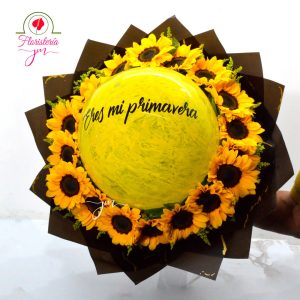 Bouquet con mensaje 'Eres mi primavera' rodeado de girasoles – Floristería JM